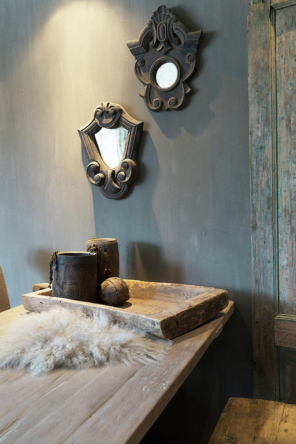 Two Mirrors In Ornate Frames On Grey Wall Above Wooden Table Photograph by Jansje Klazinga