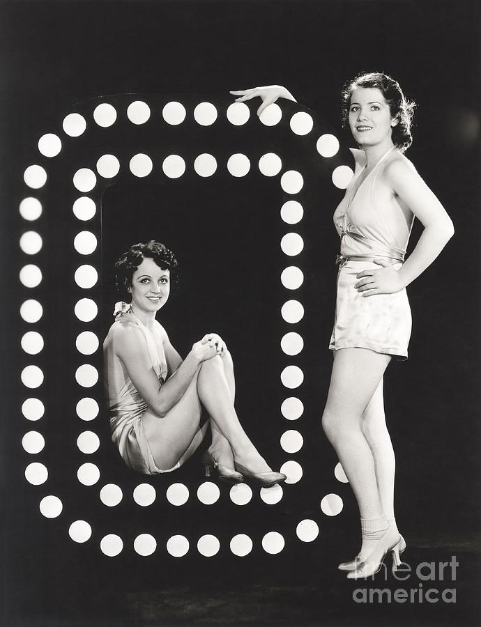 Play Photograph - Two Models Posing By Large Letter O by Everett Collection