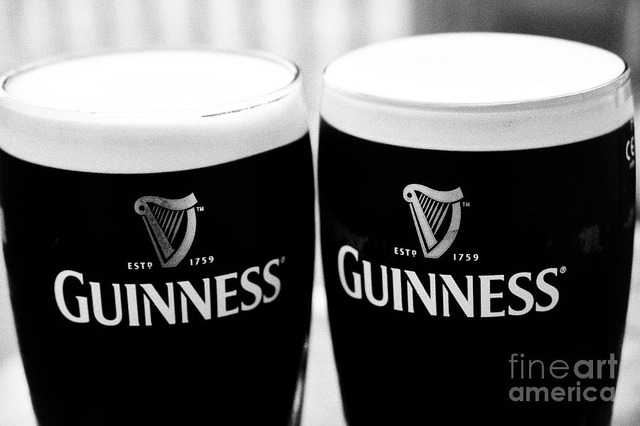 Two pints of the black stuff, Guinness Photograph by David Cordner Pixels