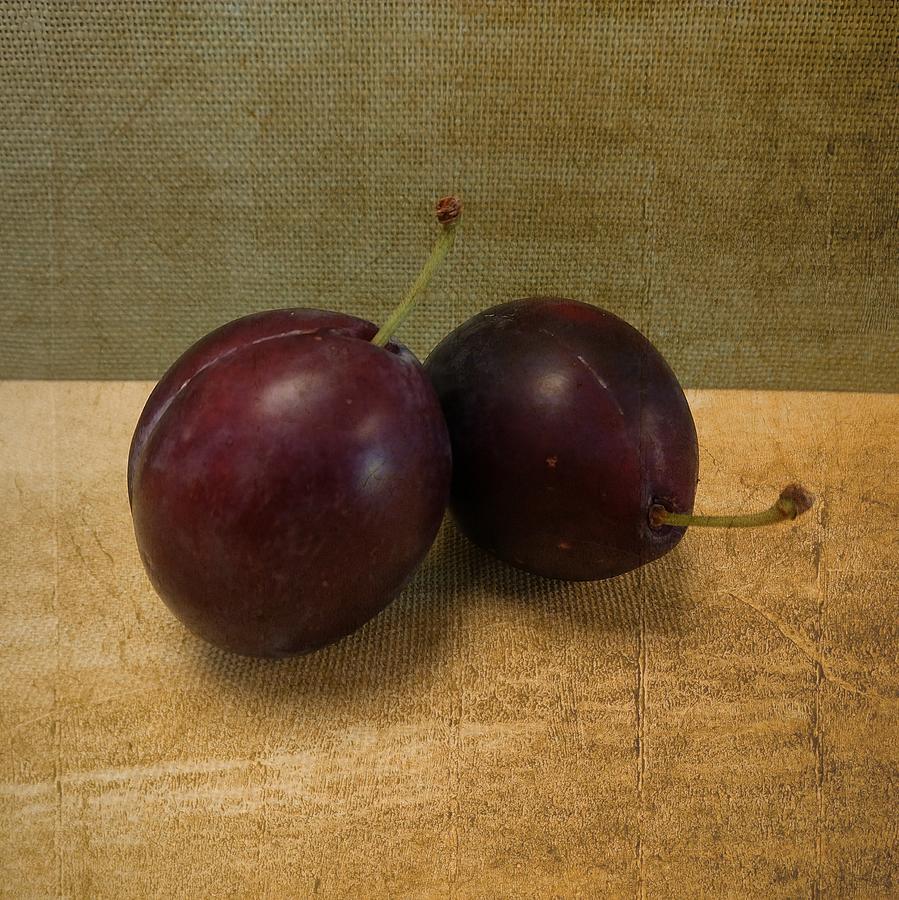 Two Plums with Stems Photograph by Michelle Calkins