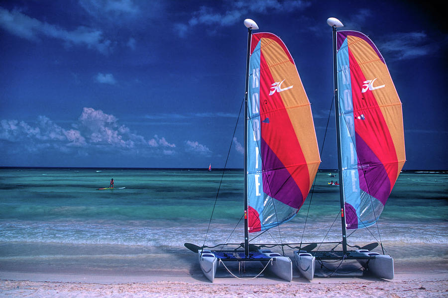Two sailboats on beach Photograph by David Smith