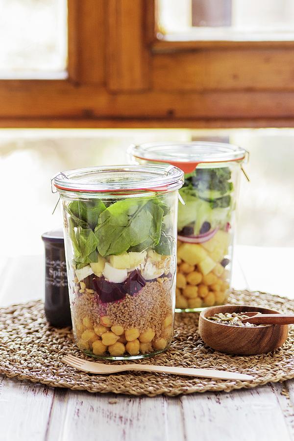 Two Salads In Jars Prepared In A Buffet Service For A Brunch With A Mix Of Seeds For Dressing Photograph by Vernica Orti