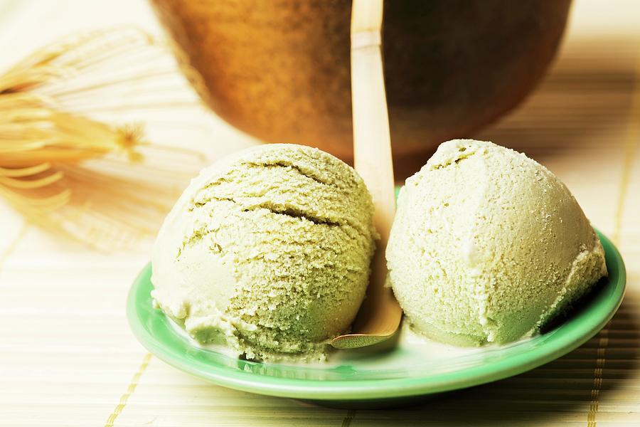 Two Scoops Of Home-made Green Tea Ice Cream With Japanese Matcha Accessories Photograph by Robert Kneschke