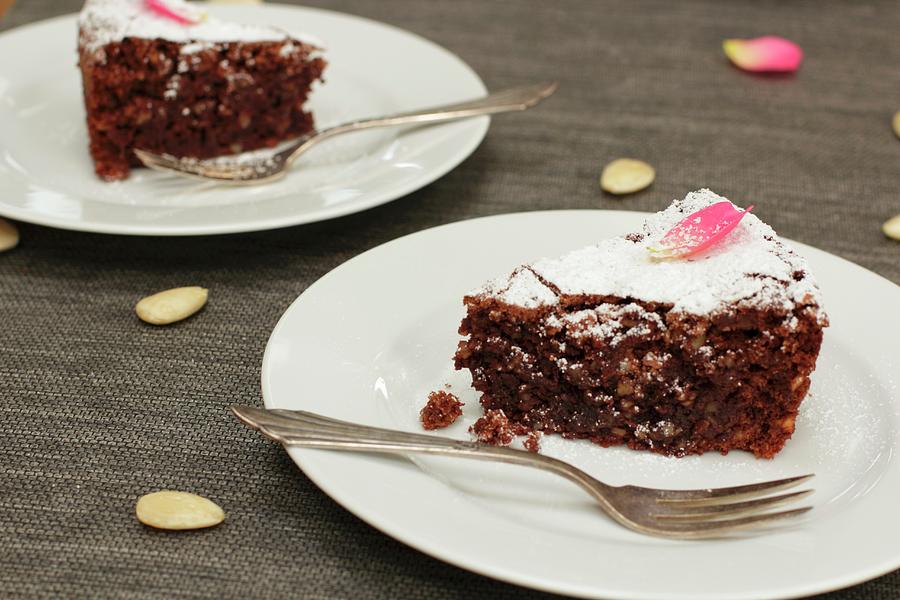 Two Slices Of Chocolate Almond Cake On Plates italy Photograph by Barbara Djassemi
