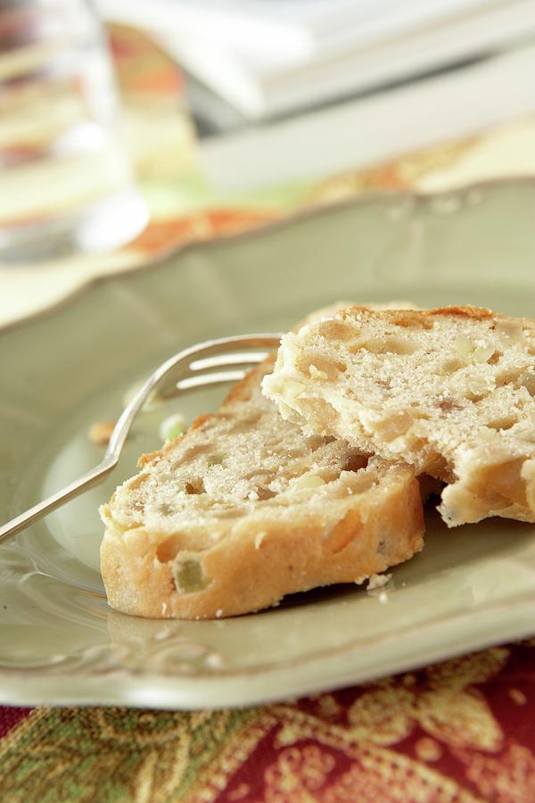 Two Slices Of Diabetic Stollen With Almonds And Candied Fruit Photograph by Till Melchior