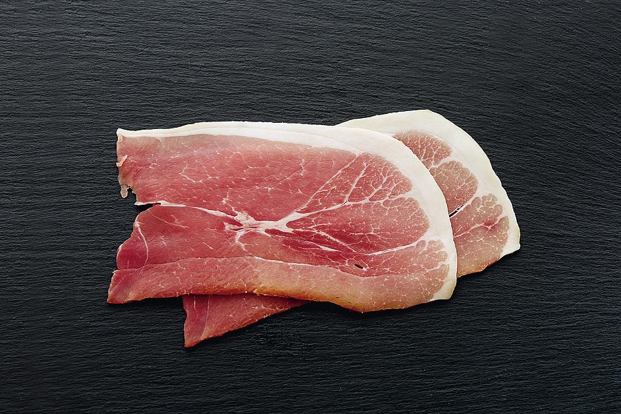 Two Slices Of Holsteiner Katenschinken Ham Photograph by Jalag / Michael Bernhardi