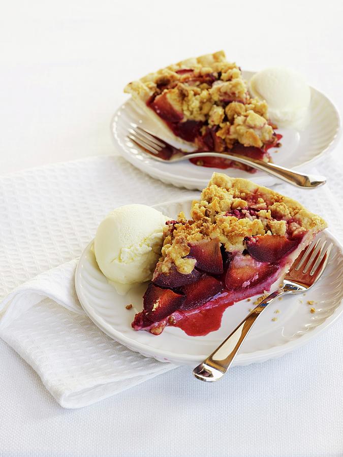 Two Slices Of Plum Crumble Pie With Vanilla Ice Cream Photograph by Vincent Noguchi Photography