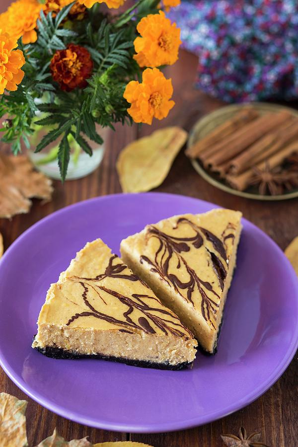 Two Slices Of Pumpkin Cheesecake With Chocolate Photograph by Malgorzata Laniak