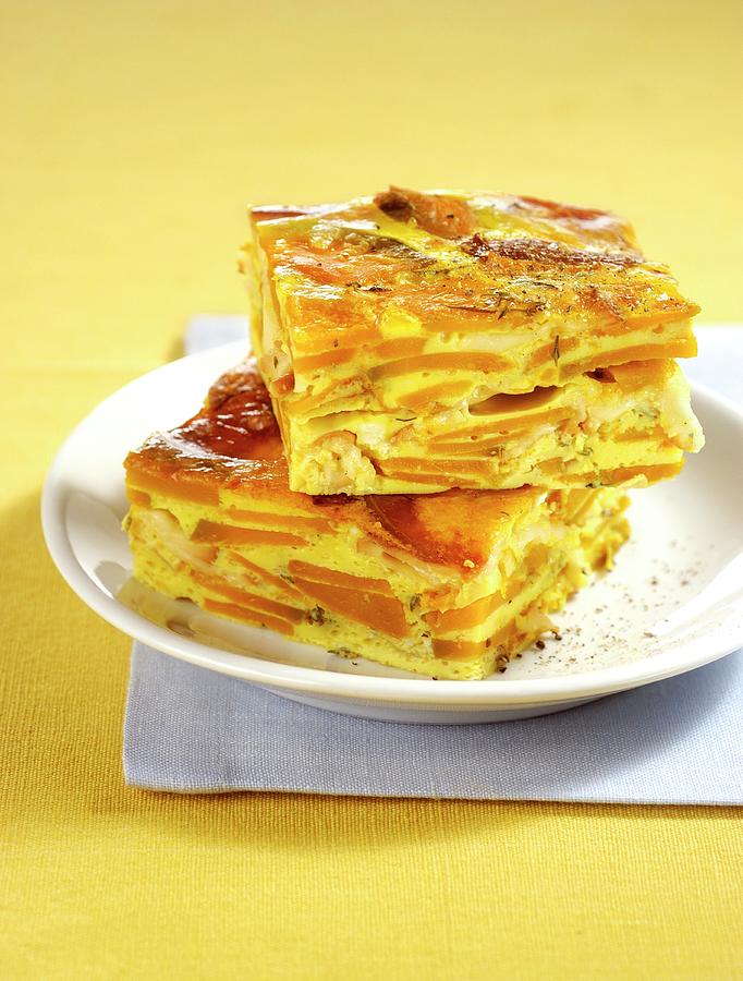 Two Slices Of Pumpkin Frittata Photograph by Franco Pizzochero