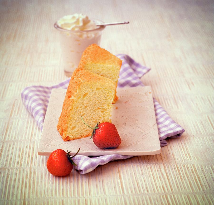 Two Slices Of Sponge Cake With Cream And Strawberries Photograph by Matthias Hoffmann