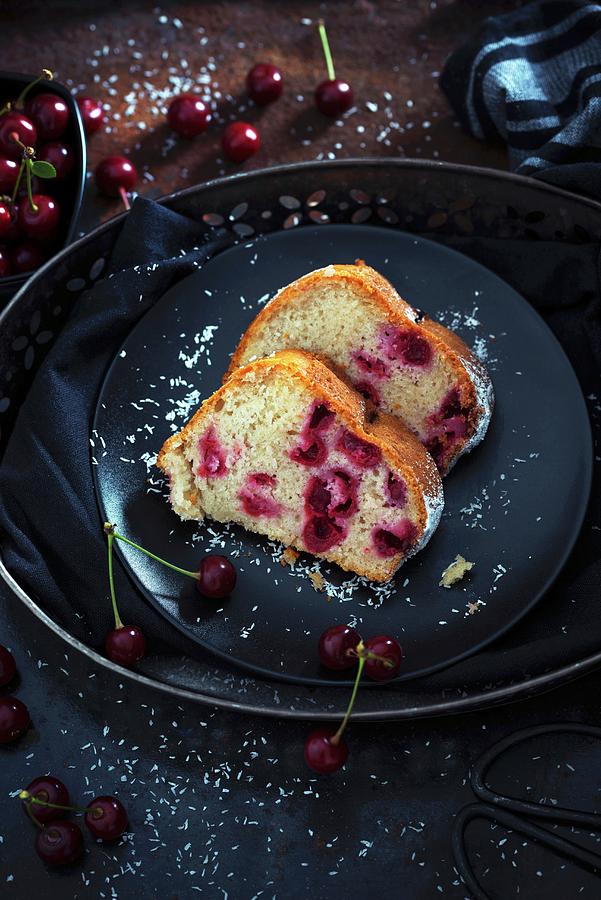 Two Slices Of Vegan Coconut Bundt Cake With Sour Cherries Photograph by Kati Neudert