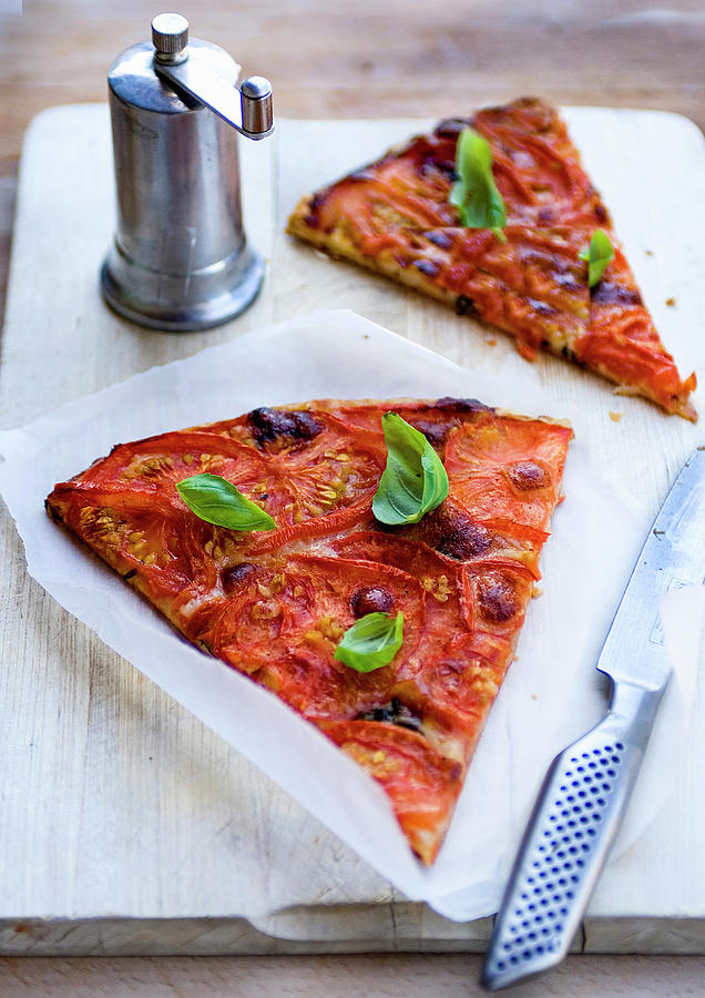 Two Slices Tomato Tart With Basil And Pepper Mill Photograph by Michael Paul