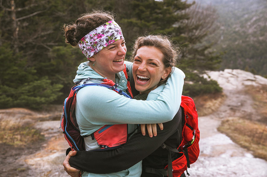 Two Smiling Female Hikers Embracing Mt Photograph By Kat Carney Fine