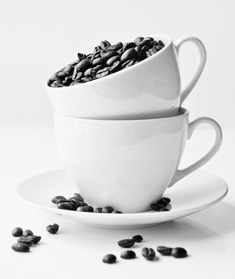Two Teacups With Coffee Beans Photograph by Natalia Ganelin