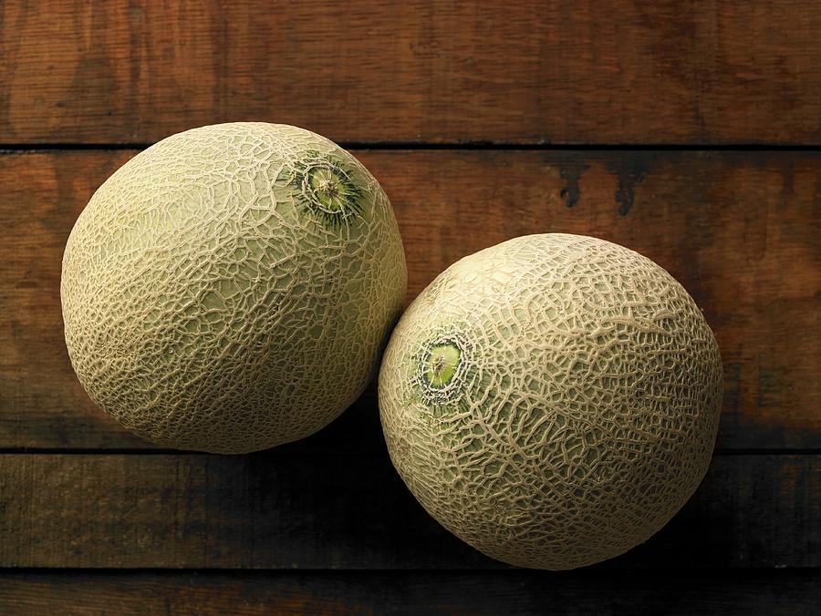 Two Whole Cantaloupe Melons Photograph by Douglas Johns