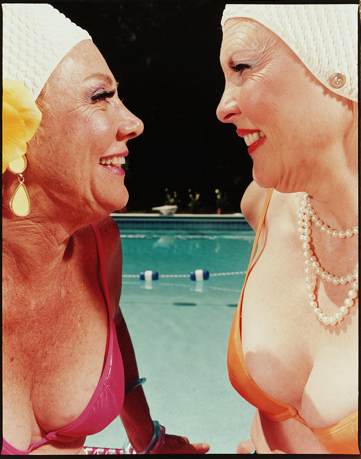 Two Women By Pool Photograph by Silvia Otte