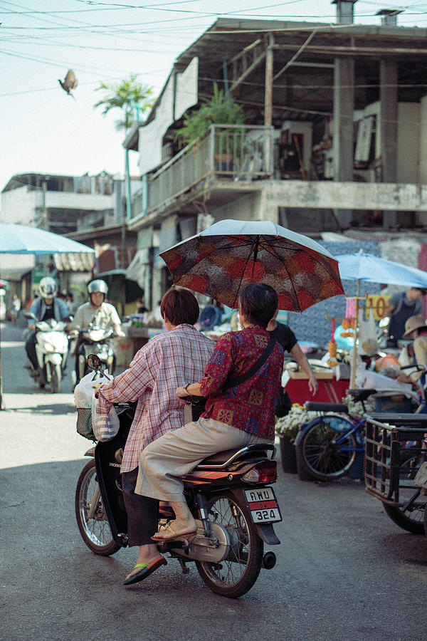 Two women on a scooter in Thailand Photograph by Kodama - Fine Art America