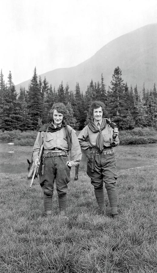 Two women on a trek with rifles and cartridge belts, ca. 1920 Painting by Celestial Images