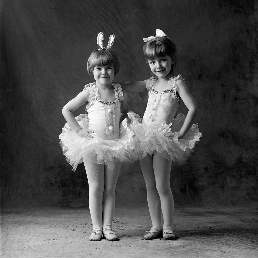 Two Young Caucasian Sisters Pose In Photograph by Photodisc