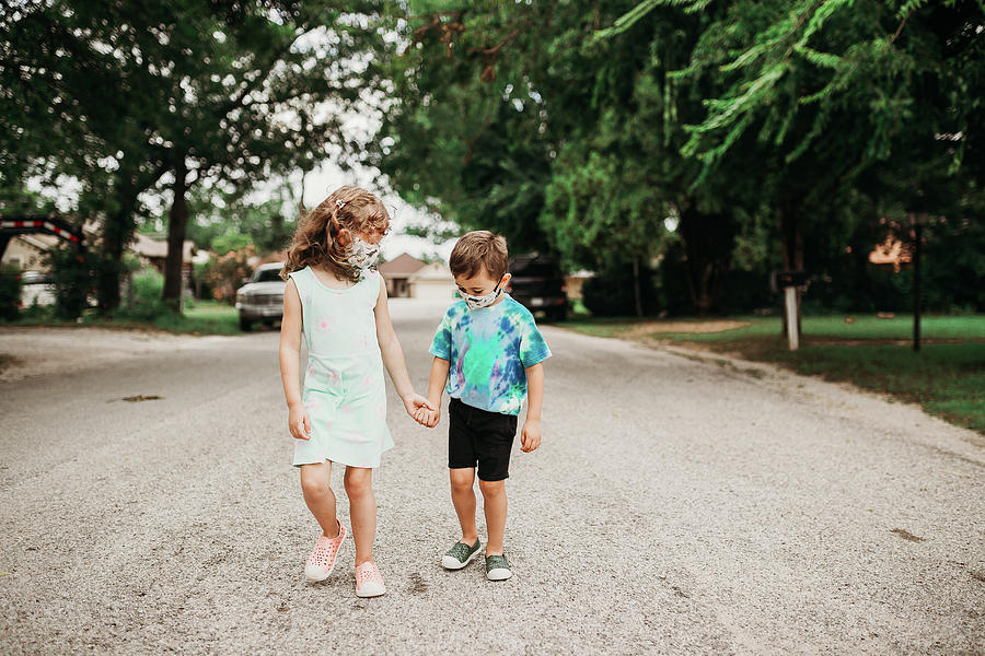 Two Young Kids Going For Walk Together Wearing Homemade Masks ...