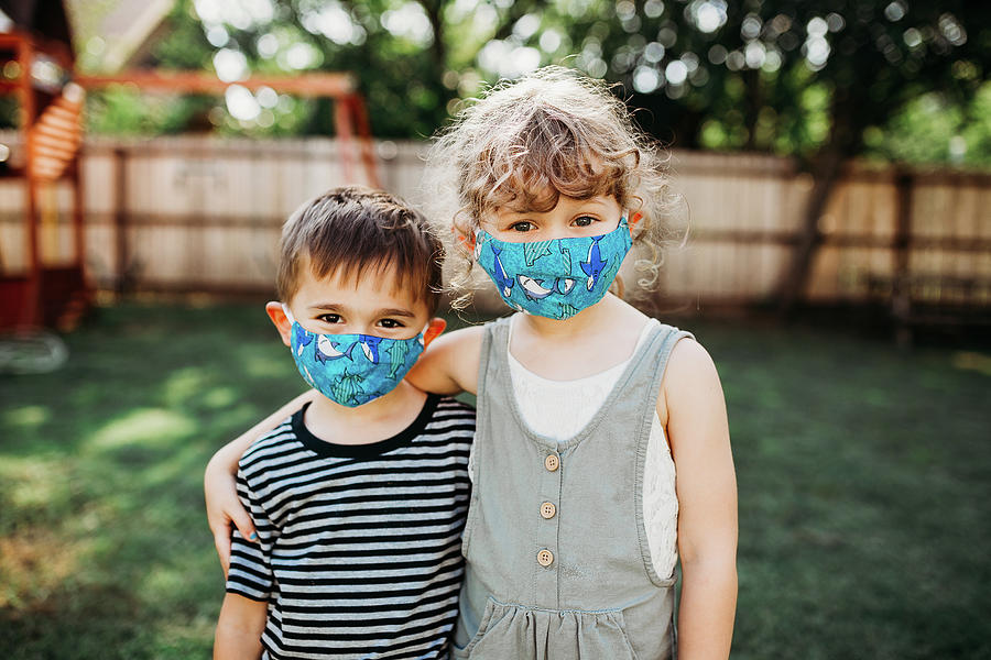 Two Young Kids Standing Outside Together Wearing Homemade Masks ...