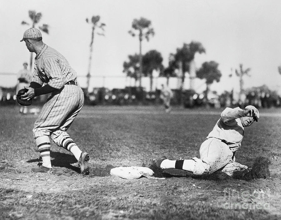 Ty Cobb Slides Back To First 1928 Photograph by Bettmann