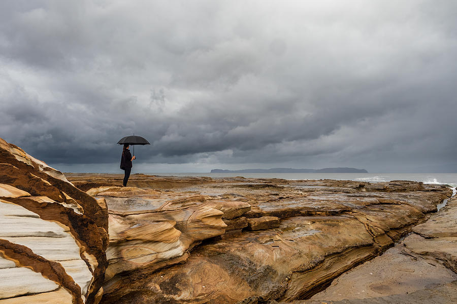 Umbrella On The Rocks Photograph by Michel Groleau