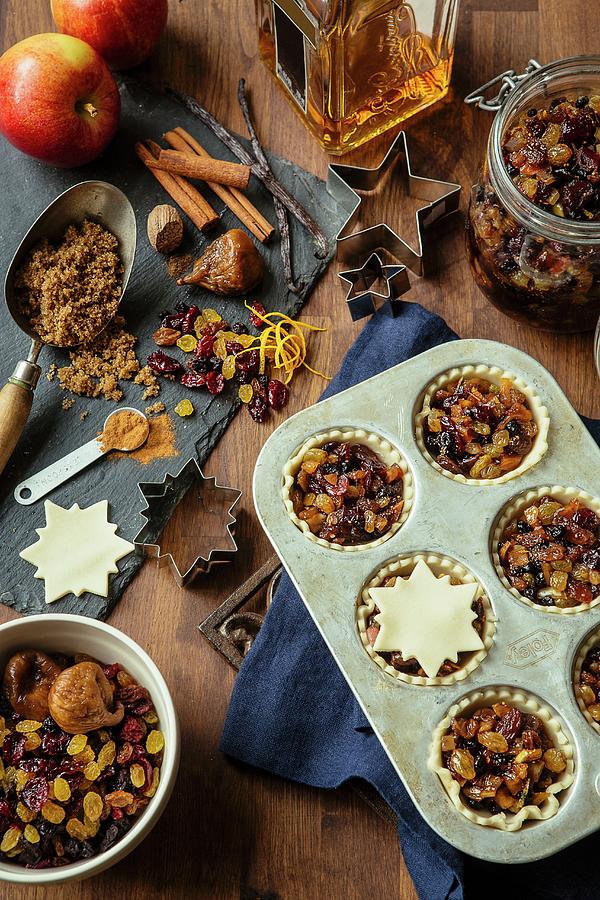 Unbaked Mince Pies With Ingredients For Christmas Photograph by Tracey Kusiewicz