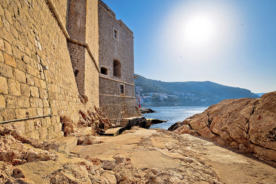Under the Dubrovnik city walls view Photograph by Brch Photography