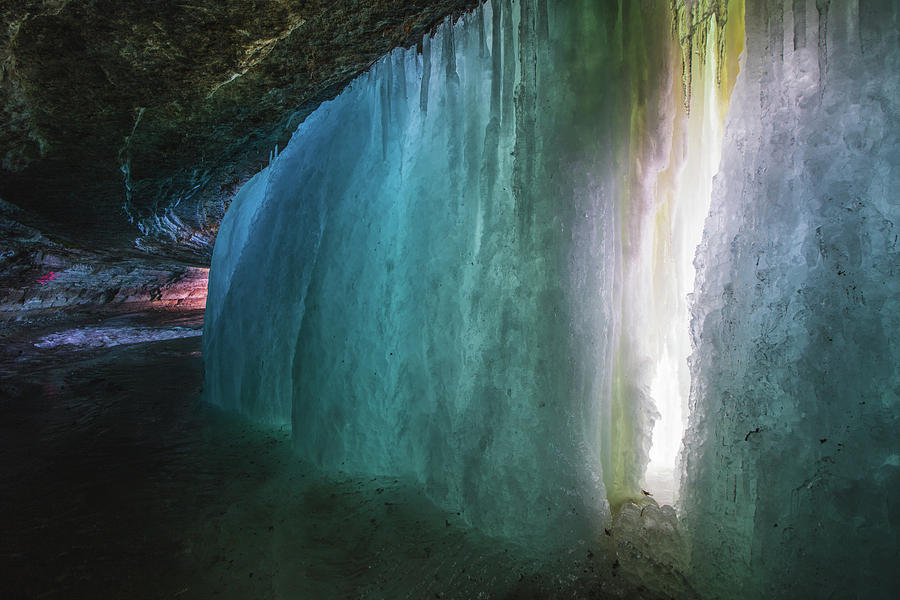 Ice caves under the Minnehaha Falls Photograph by Jay Smith