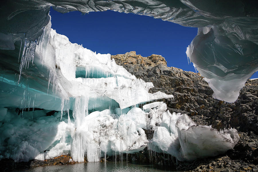 Under The Glacier Photograph by Andras Jancsik