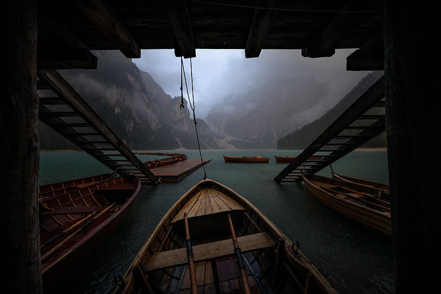 Boat Photograph - Under The Pier During The Storm by Marco Tagliarino
