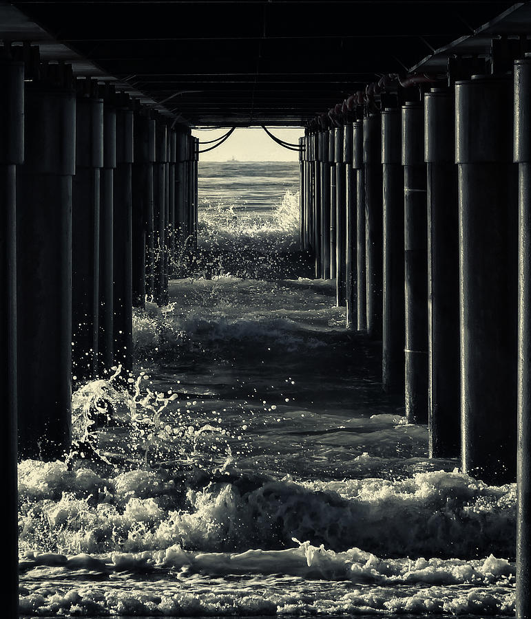 Black And White Photograph - Under The Pier by Marco Bianchetti