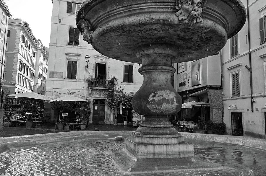 Underneath Ancient Roman Piazza Fountain Urban Street Scene Black and White Photograph by Shawn OBrien
