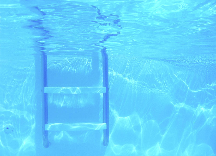 Underwater Pool Ladder Photograph by Kathy Van Torne