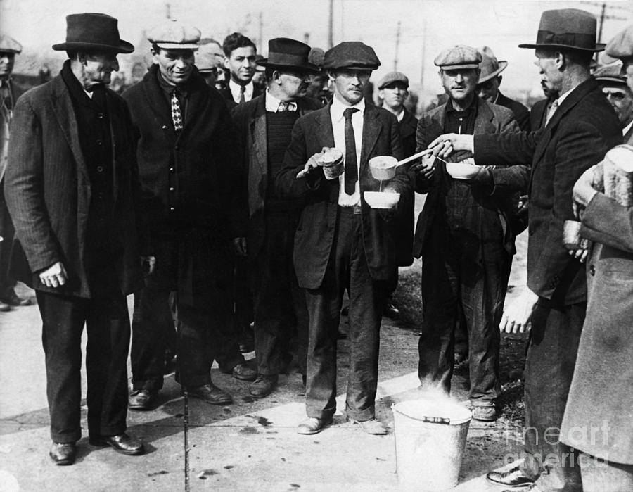 Unemployed Men Receive Soup And Bread Photograph by Bettmann