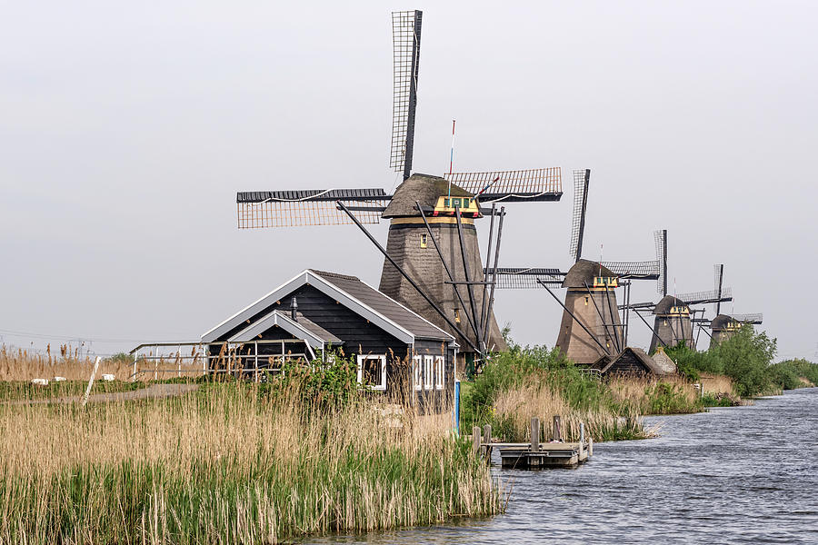UNESCO windmills in Kinderdijk Photograph by Wolfgang Stocker
