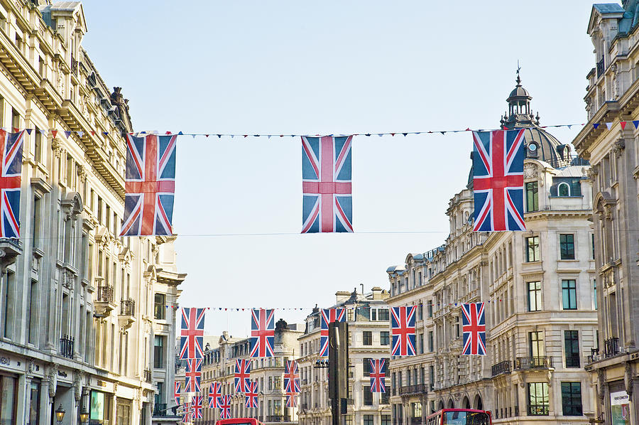 Union Jack Flags On Regent Street Photograph by John Harper