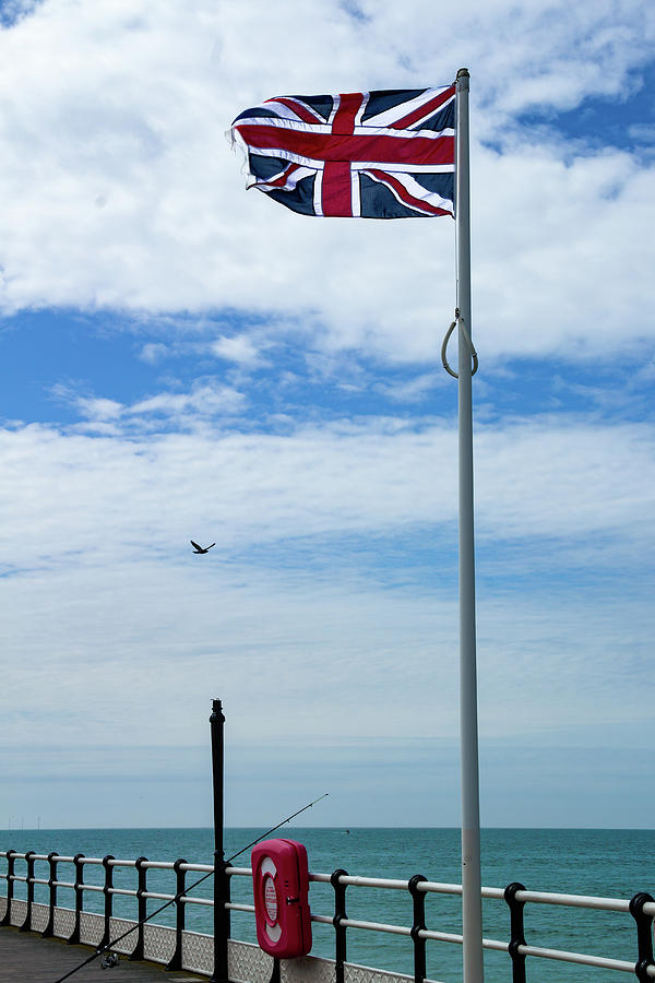 Union Jack Flying in Breeze Photograph by Roslyn Wilkins
