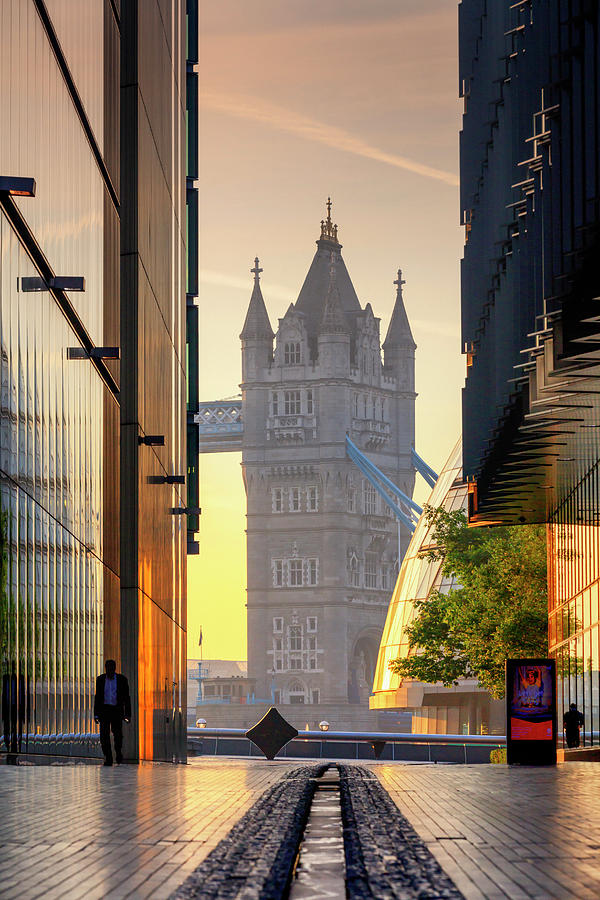 United Kingdom, England, London, Great Britain, City Of London, People Walking In The Early Morning With Tower Bridge And The Town Hall In The Background Digital Art by Maurizio Rellini
