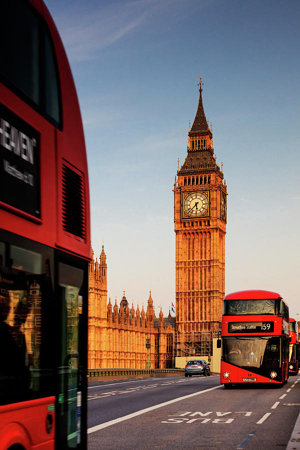 United Kingdom, England, London, Great Britain, City Of Westminster, Palace Of Westminster, Houses Of Parliament, Red Buses Passing On Westminster Bridge With The Big Ben In The Background At Sunrise Digital Art by Maurizio Rellini