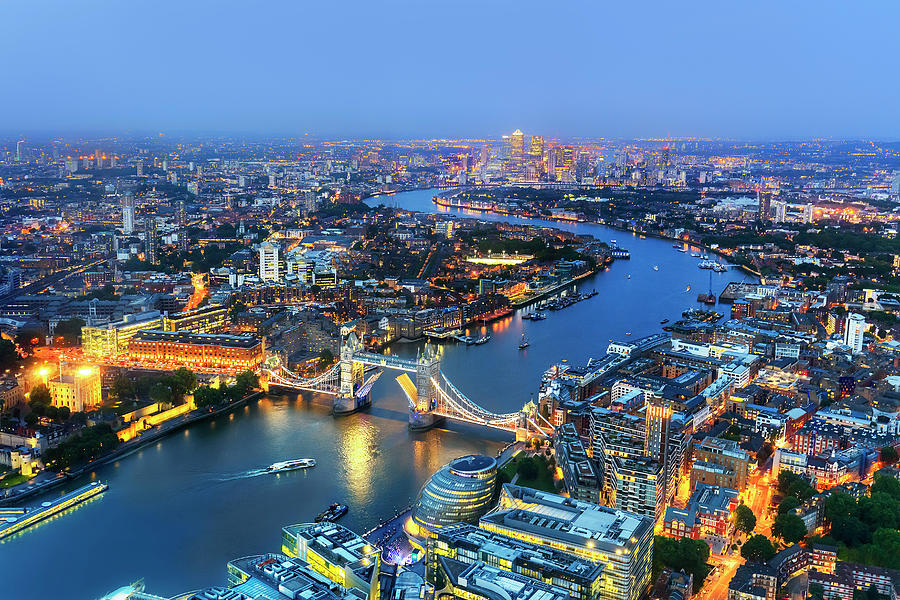 United Kingdom, England, London, Great Britain, Thames, City Of London, Tower Bridge, Tower Bridge And Canary Wharf Aerial View By Night Digital Art by Maurizio Rellini