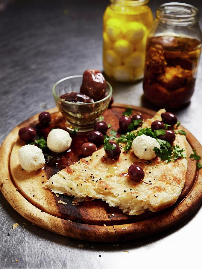 Unleavened Bread With Preserved Olives And Cheese Balls Photograph by Great Stock!