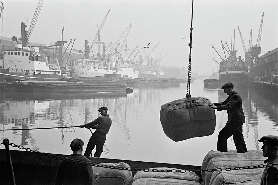 Unloading Bales Of Wool Photograph by Bert Hardy