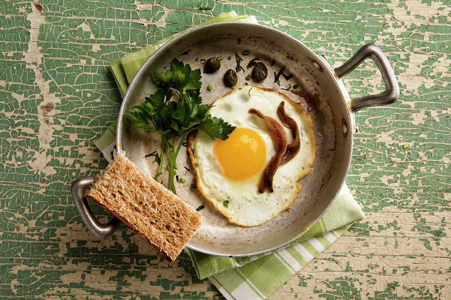 Uovo Con Le Acciughe fried Egg With Anchovies, Italy Photograph by Blueberrystudio
