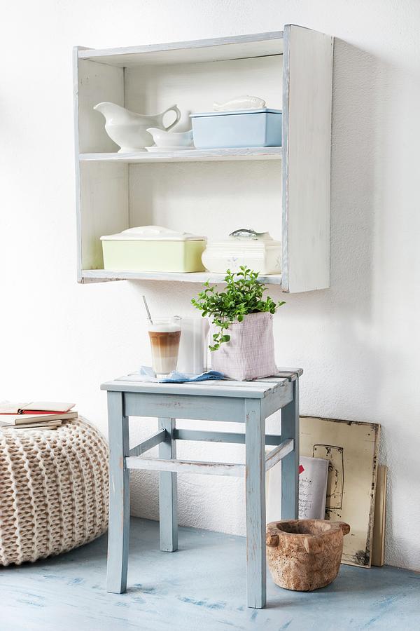 upcycling-grey-blue-stool-between-pouffe-and-wooden-mortar-on-floor