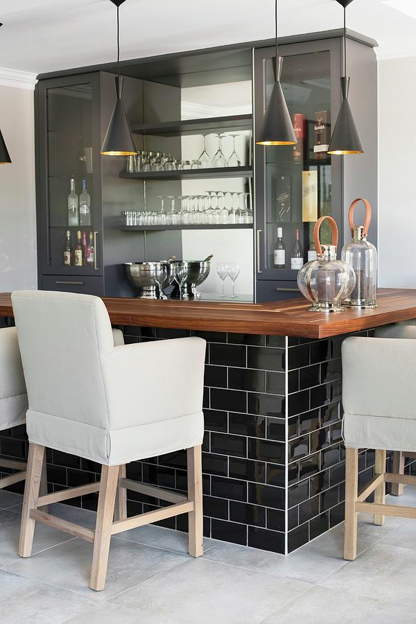 Upholstered Bar Stools At Black And Grey Bar With Wooden Worksurface Photograph by Great Stock!
