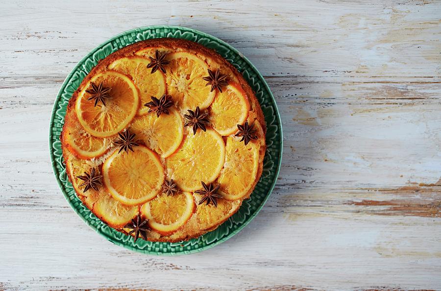 Upside-down Flourless Orange Cake With Star Anise Photograph by Charlotte Kibbles