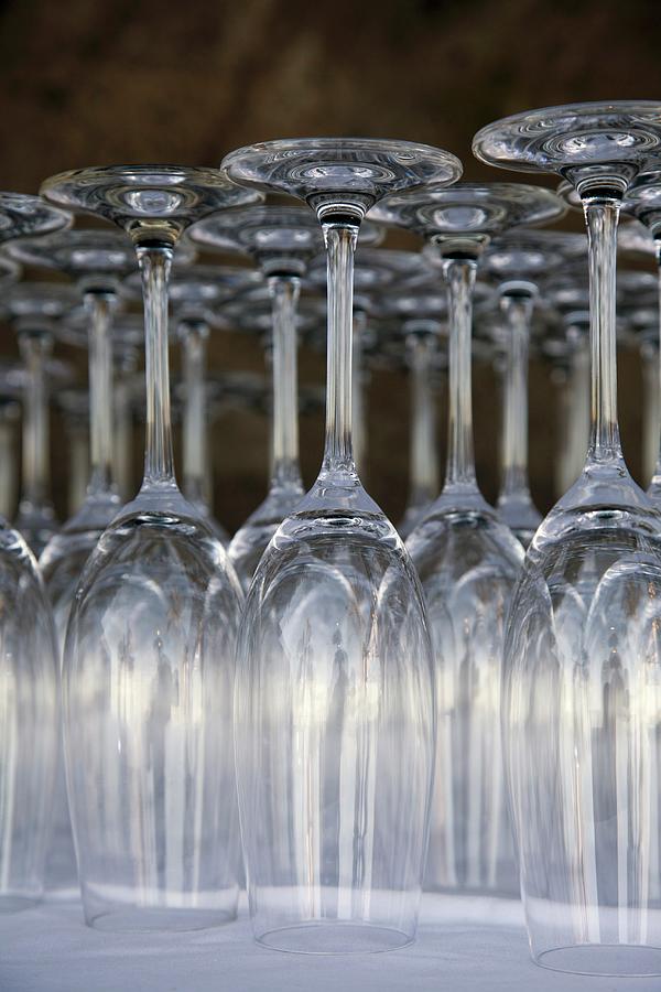 Upturned Empty Champagne Flutes Photograph by Giannis Agelou