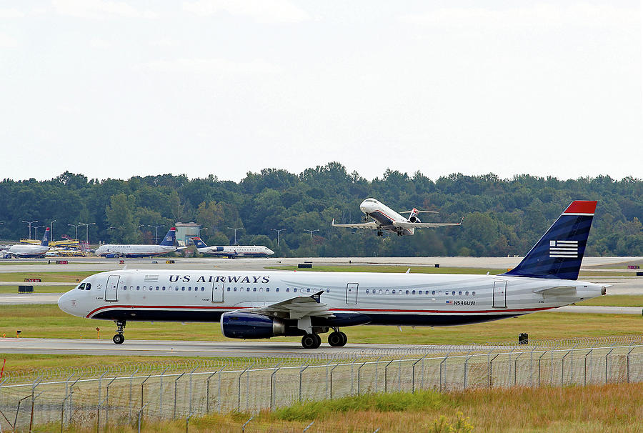 US Airways Takeoff Photograph by Joseph C Hinson